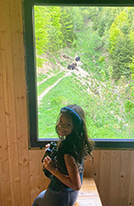 Little girl in a Romanian wildlife observatory